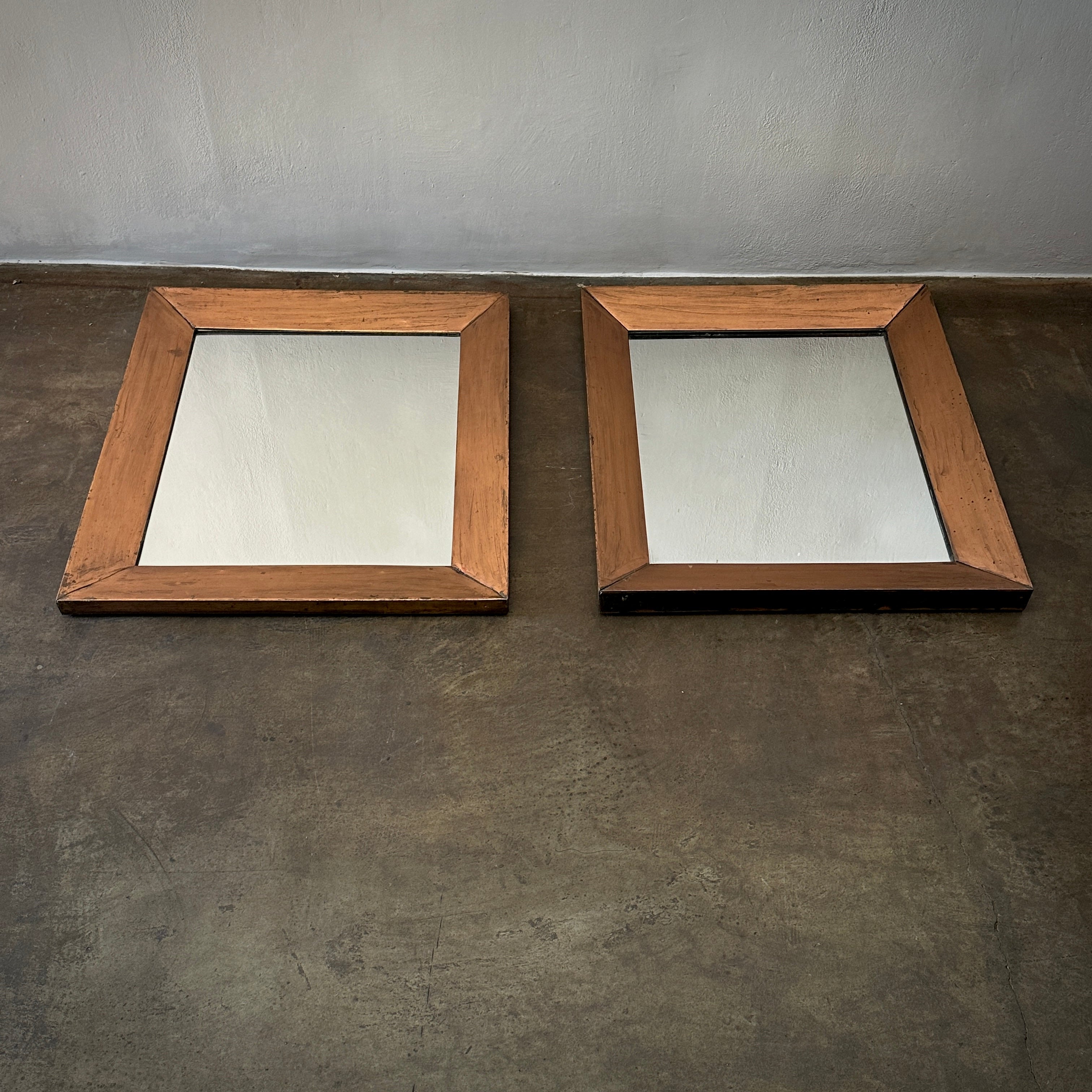 Pair of Copper Framed Mirrors