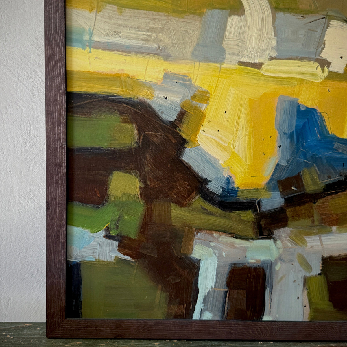Abstract painting with a brown horse figure in a wooden frame.