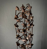 Mounted Metallic Sculpture