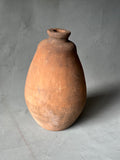 A TERRA-COTTA VESSEL