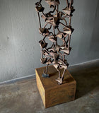 Mounted Metallic Sculpture