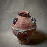 A PAINTED TERRA-COTTA VESSEL