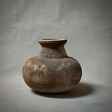A terracotta vessel by Bill Moon