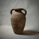 A decorative terracotta vessel