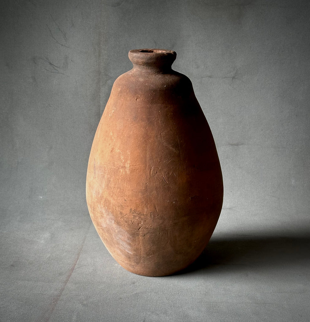 A TERRA-COTTA VESSEL