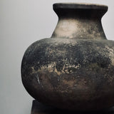 A terracotta vessel by Bill Moon