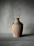 A TERRA-COTTA VESSEL