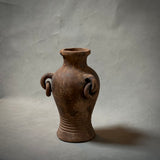 A decorative terracotta vessel