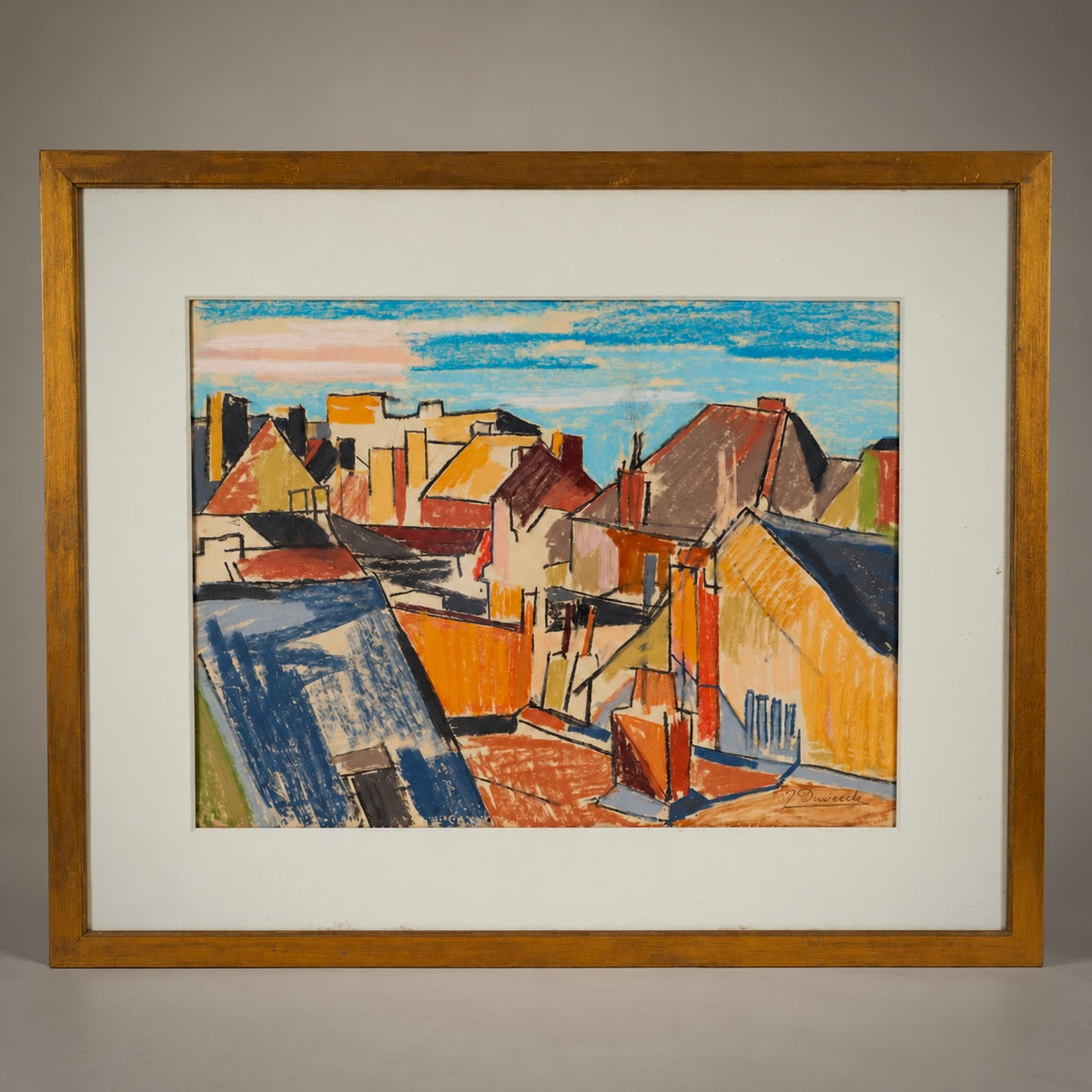 A framed art print depicting an abstract cityscape with colorful rooftops and a blue sky, set in a white mat and a warm brown wooden frame against a neutral gray background.