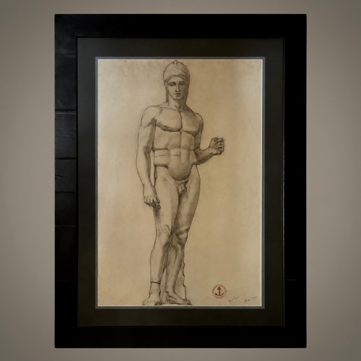 19th-century academic charcoal drawing of a standing male figure, framed in dark wood with a gray mat.