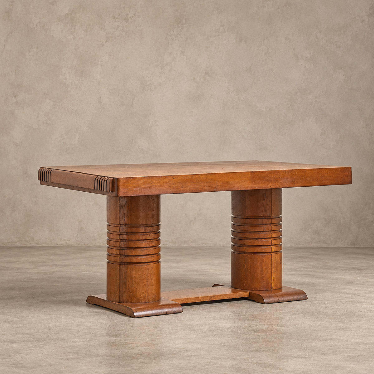 A mid-century modern wooden dining table with a warm medium-brown finish, featuring cylindrical ribbed pedestal legs and a rectangular top, set against a textured beige studio backdrop.
