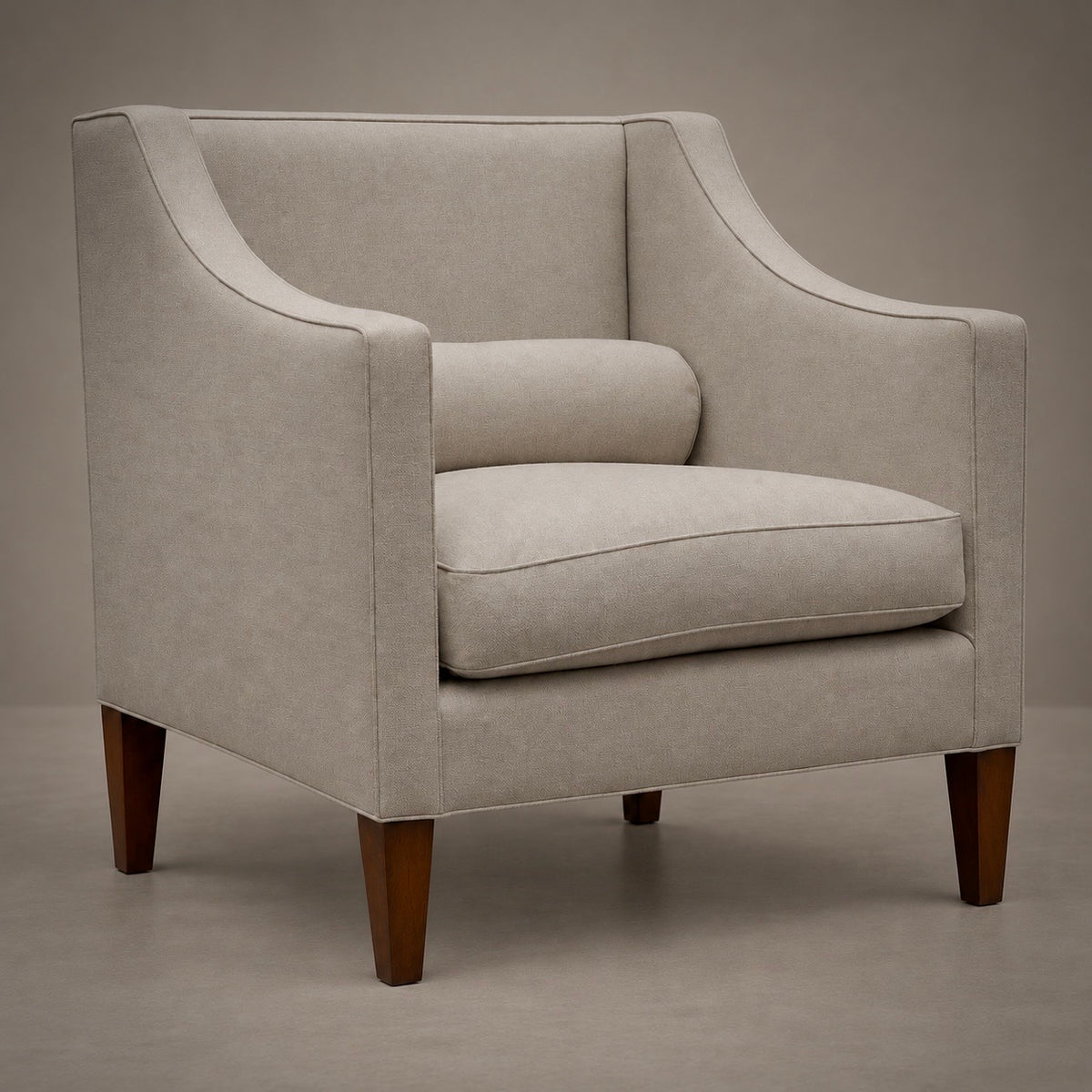 A classic upholstered armchair with a light beige textured fabric, curved arms, a matching back cushion, and tapered dark brown wooden legs, shown against a neutral studio backdrop.