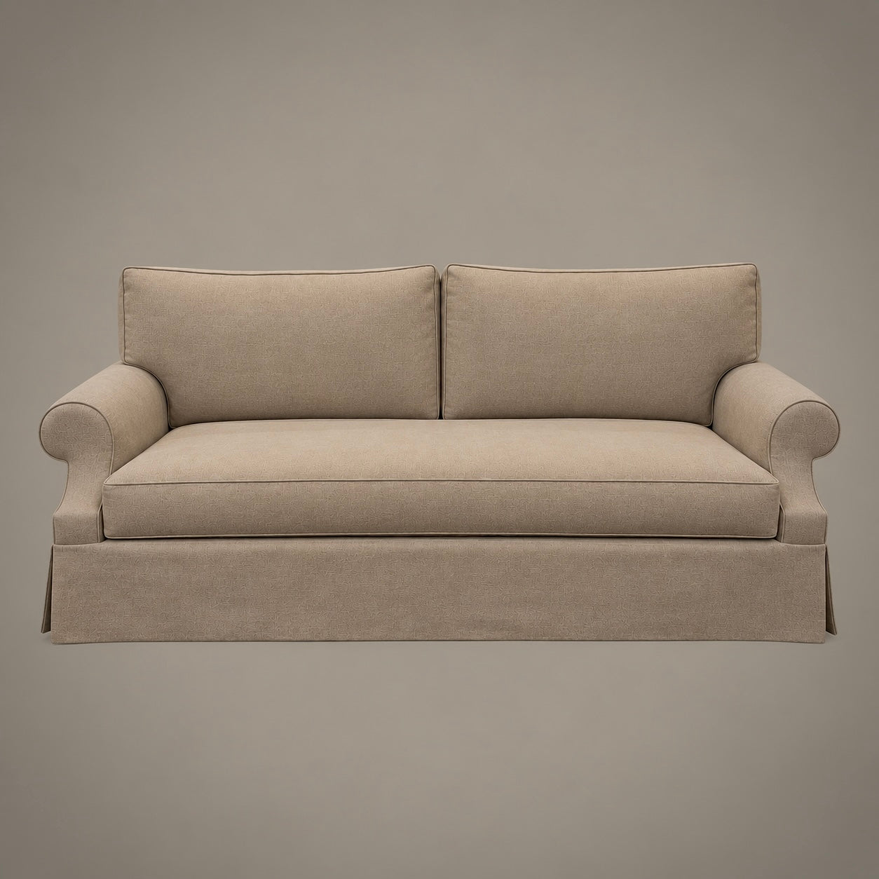 A threeseater upholstered loveseat with rolled arms and a skirted base, shown against a plain taupe-gray studio background.