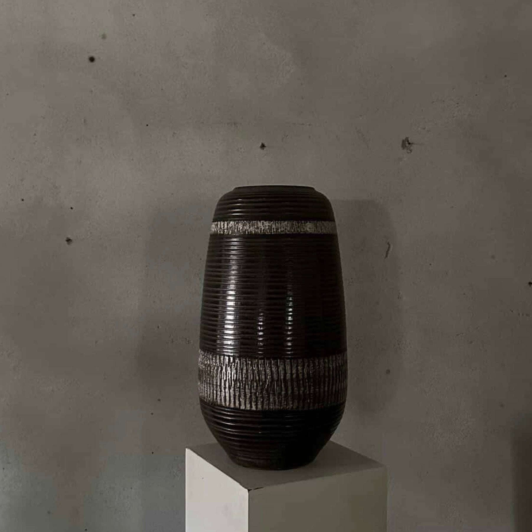 Brown Vase with White Elements
