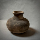A terracotta vessel by Bill Moon