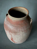 A decorative terracotta vessel