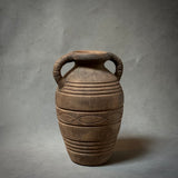 A decorative terracotta vessel