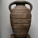 A decorative terracotta vessel